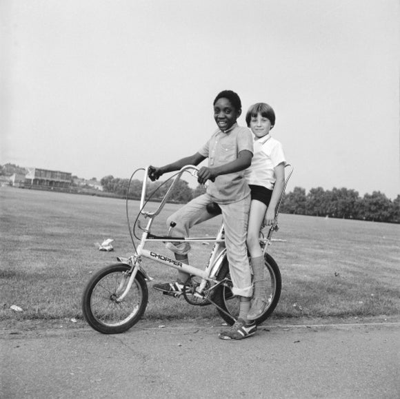 Two boys riding a bicycle: 1973