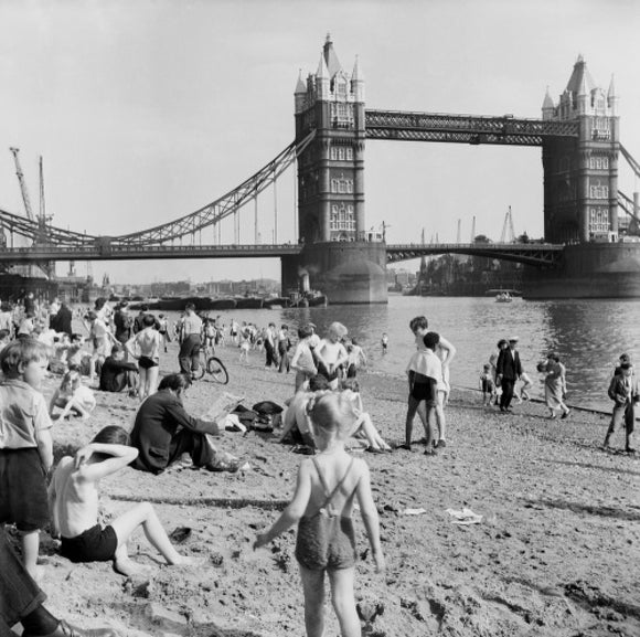 Londoners relax on Tower Beach: 1952