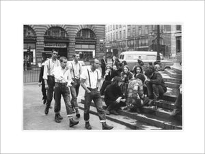 Group of skinheads & hippies in Piccadilly Circus, 1969