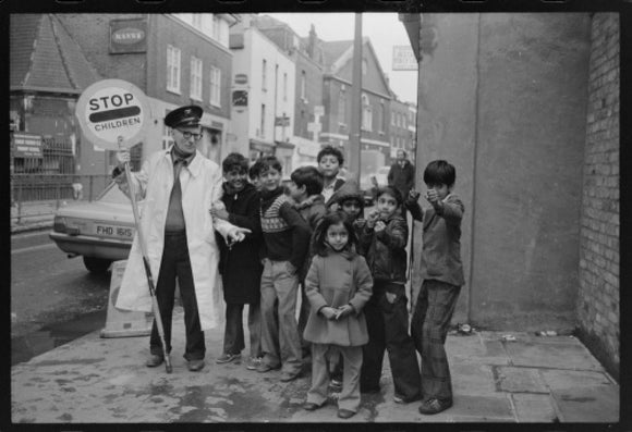 Lollipop man' with school children: 1979