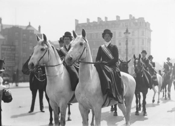 Mounted Suffragettes in a procession: 1909